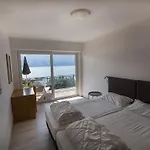 Apartmán Zwei-zimmer-wohnung Mit Seeblick- Grill Und Gemeinschaftspool By Interhome